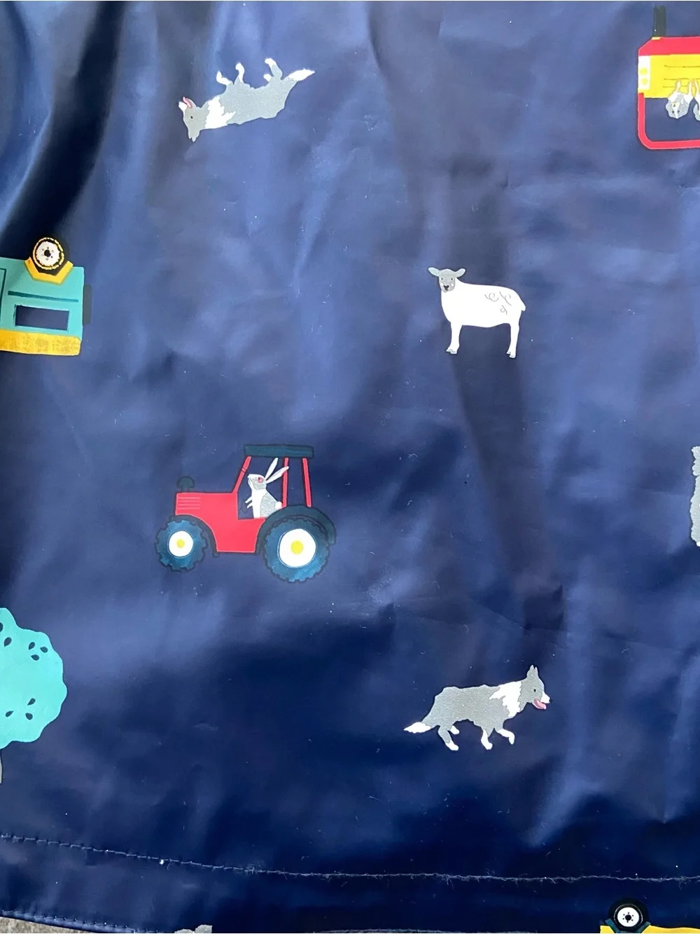 Joules Navy Rain Jacket with Colorful Vehicle Print